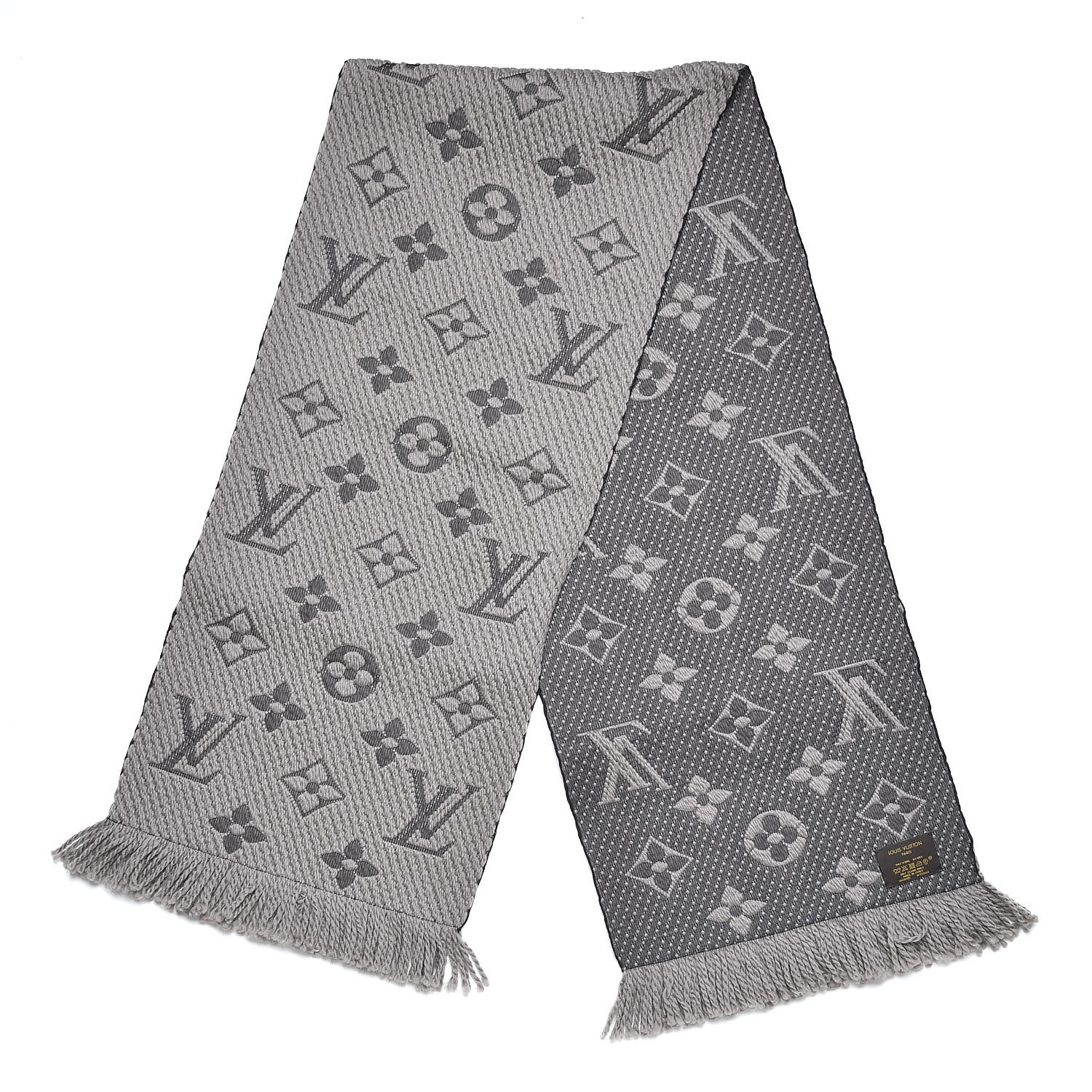 LOUIS VUITTON. TWO SILK SCARVES AND A WOOL SCARF. IN THE…