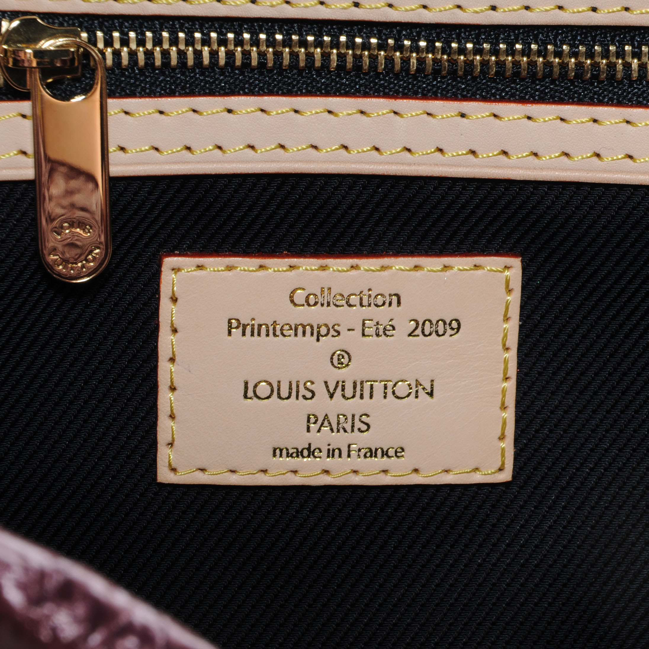 louis vuitton african queen clutch