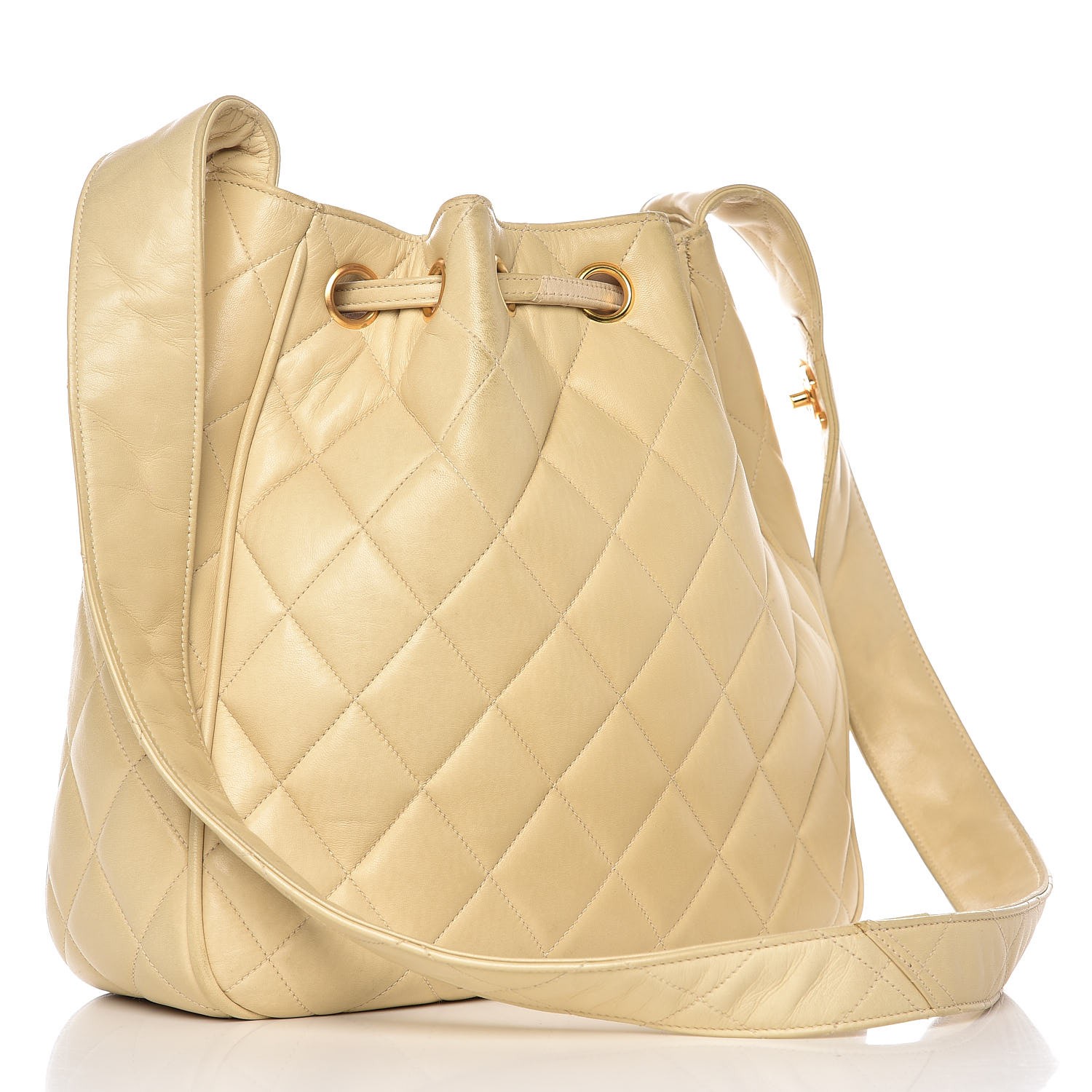 chanel quilted drawstring bag