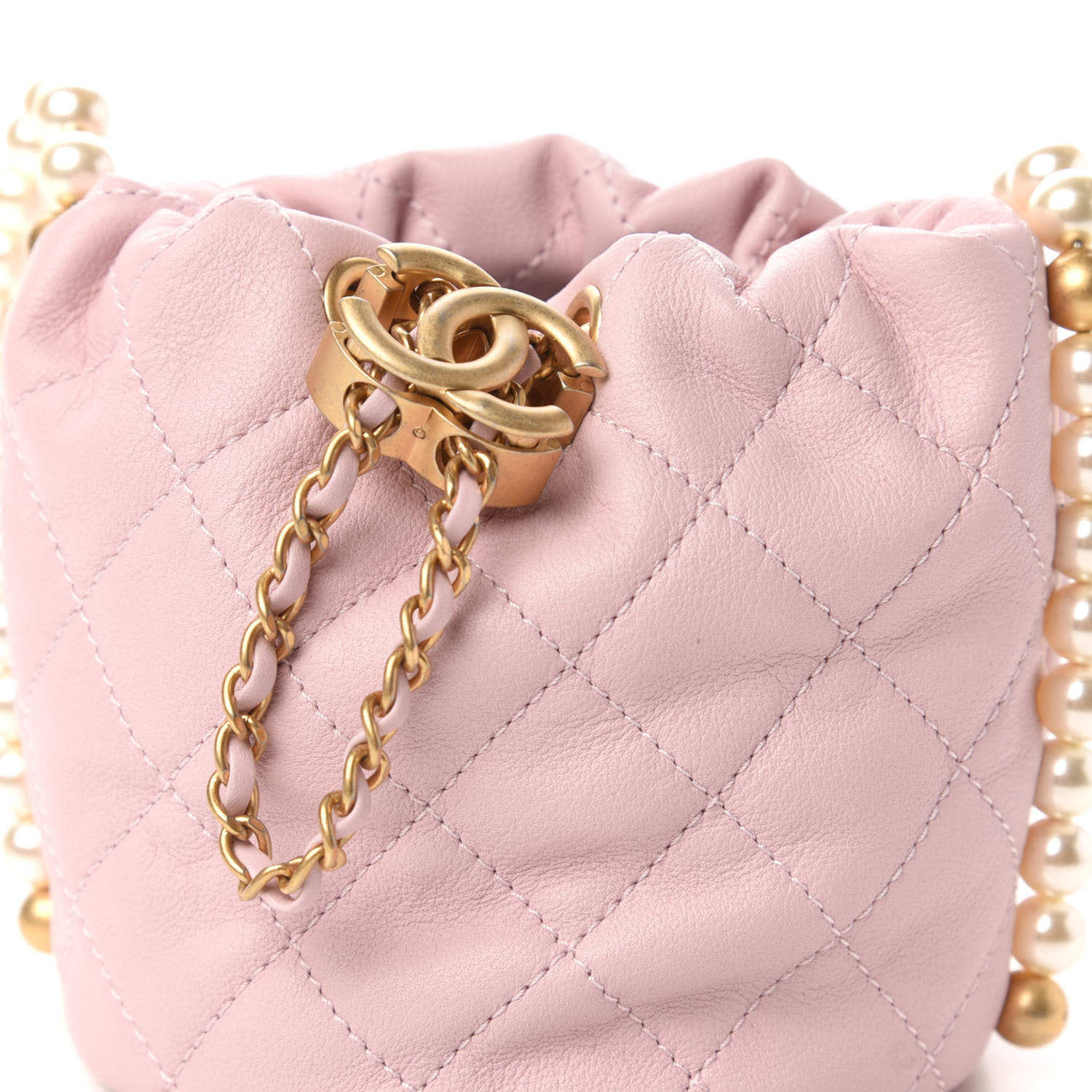 chanel quilted drawstring bag