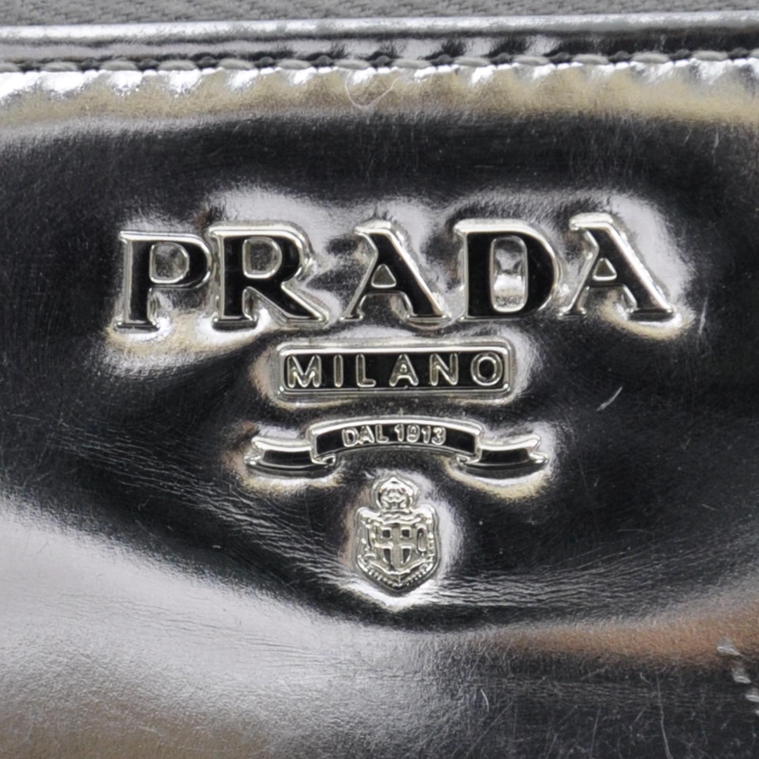 PRADA Spazzolato Zip Around Wallet Silver 33433 | FASHIONPHILE