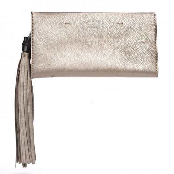 gucci bamboo tassel clutch