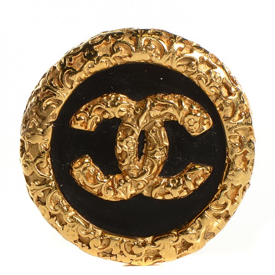 black and gold brooch