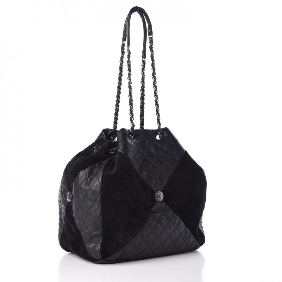 chanel quilted drawstring bag