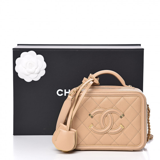 chanel caviar quilted small cc filigree vanity case