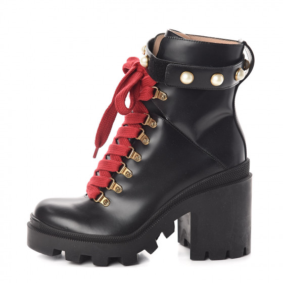 black combat boots with red laces