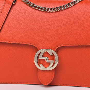 interlocking calfskin dollar shoulder orange sun bag