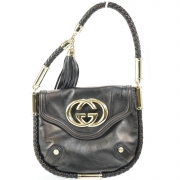 black gucci purse with tassel